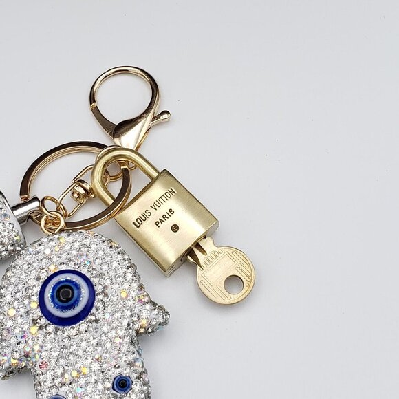 m87621071218_2.jpg?1738479171 Authentic Louis Vuitton Lock & Key with Unbranded Evil Eye Charm, Keychain